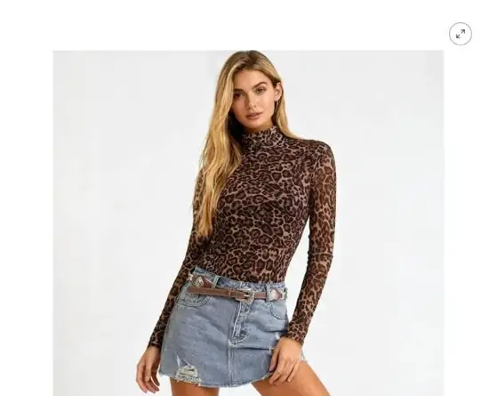Leopard print mesh long-sleeve top layered for a bolder evening look